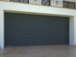 Рулонные стальные ворота DoorHan с внутривальным электроприводом из профиля RHS75 Рулонные стальные ворота DoorHan с внутривальным электроприводом из профиля RHS75